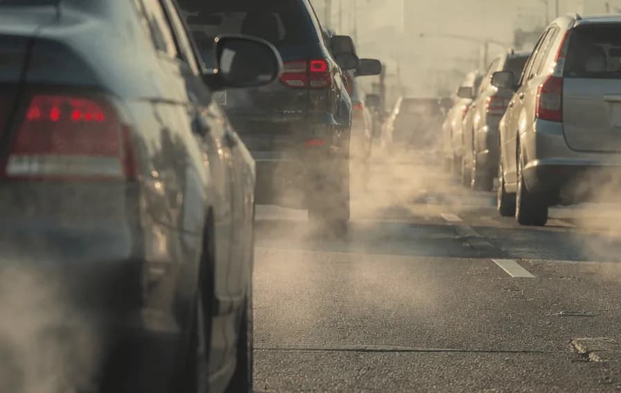 Vehicle exhaust emissions in traffic illustrating ozone air quality health effects in urban areas