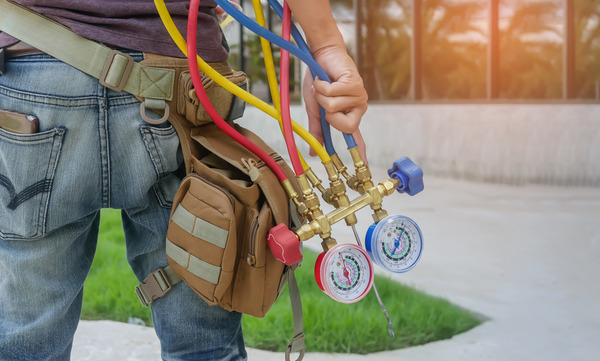 Best HVAC replacement services company in Celebration FL - A picture of Filterbuy HVAC technician doing an HVAC replacement service in Celebration FL