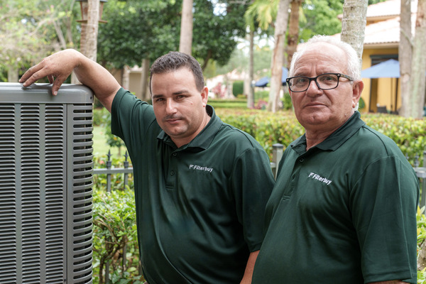 Best HVAC replacement services company in Hallandale Beach FL - A picture of Filterbuy HVAC technicians doing an HVAC replacement service in Hallandale Beach FL