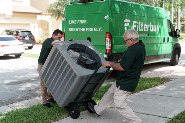 Best HVAC installation services company in Hollywood FL - A picture of Filterbuy HVAC technicians doing an HVAC installation service in Hollywood FL